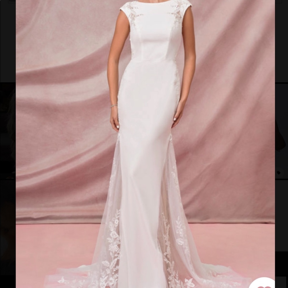 Azazie ; white with mesh back ; never worn wedding dress . Size 8